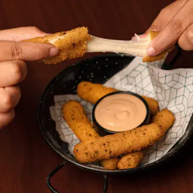 Mozzarella Sticks <span style="color: white"><br>5.5$</br></span></p>